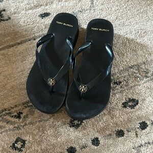 Black Tory Burch flip flops with a heel. Size 8